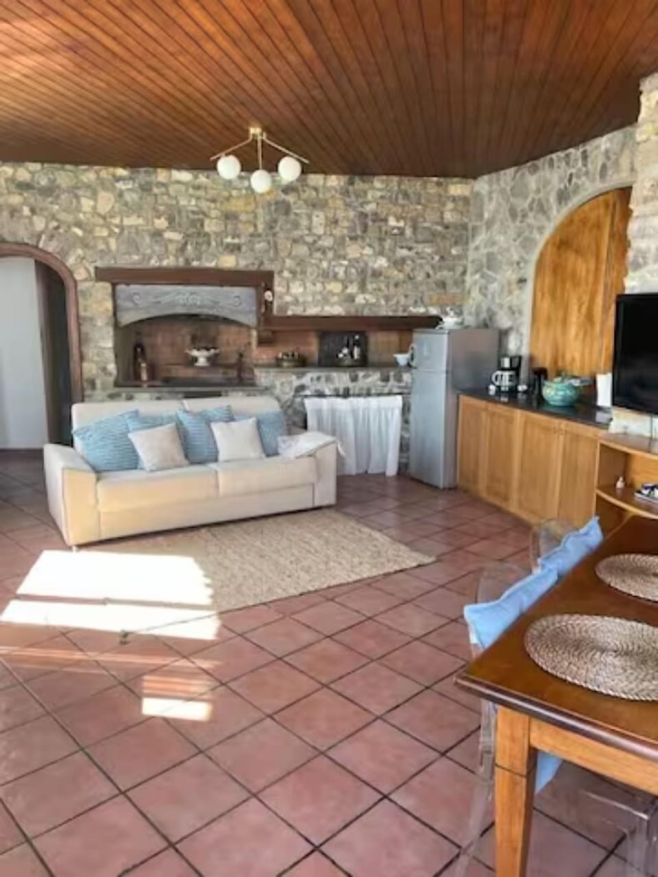 Panoramic Villa | Living area | 32-inch flat-screen TV with cable channels
