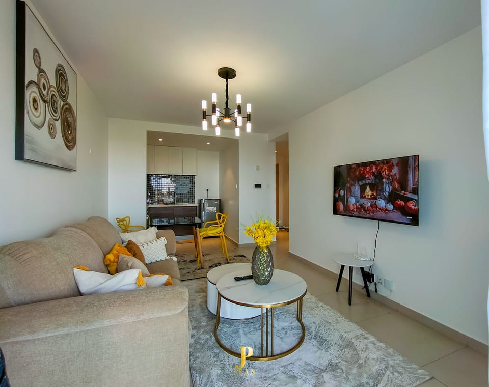 Comfort Apartment | Living area | 24-inch Smart TV with digital channels