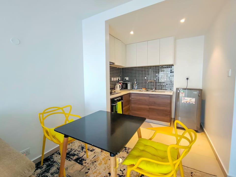 Comfort Apartment | Living area | 24-inch Smart TV with digital channels