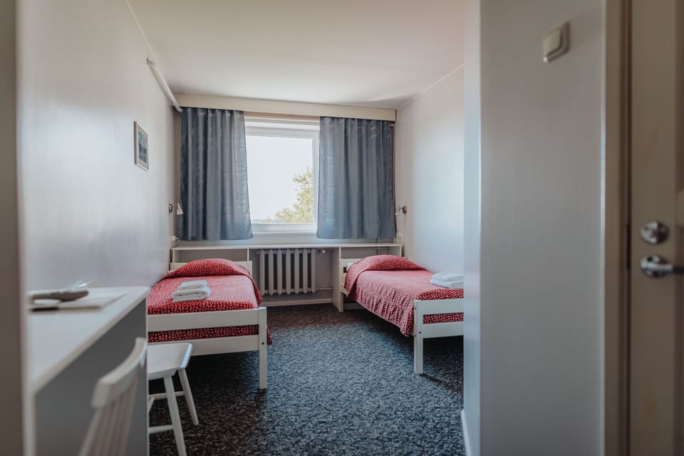 Desk, free WiFi, bed sheets