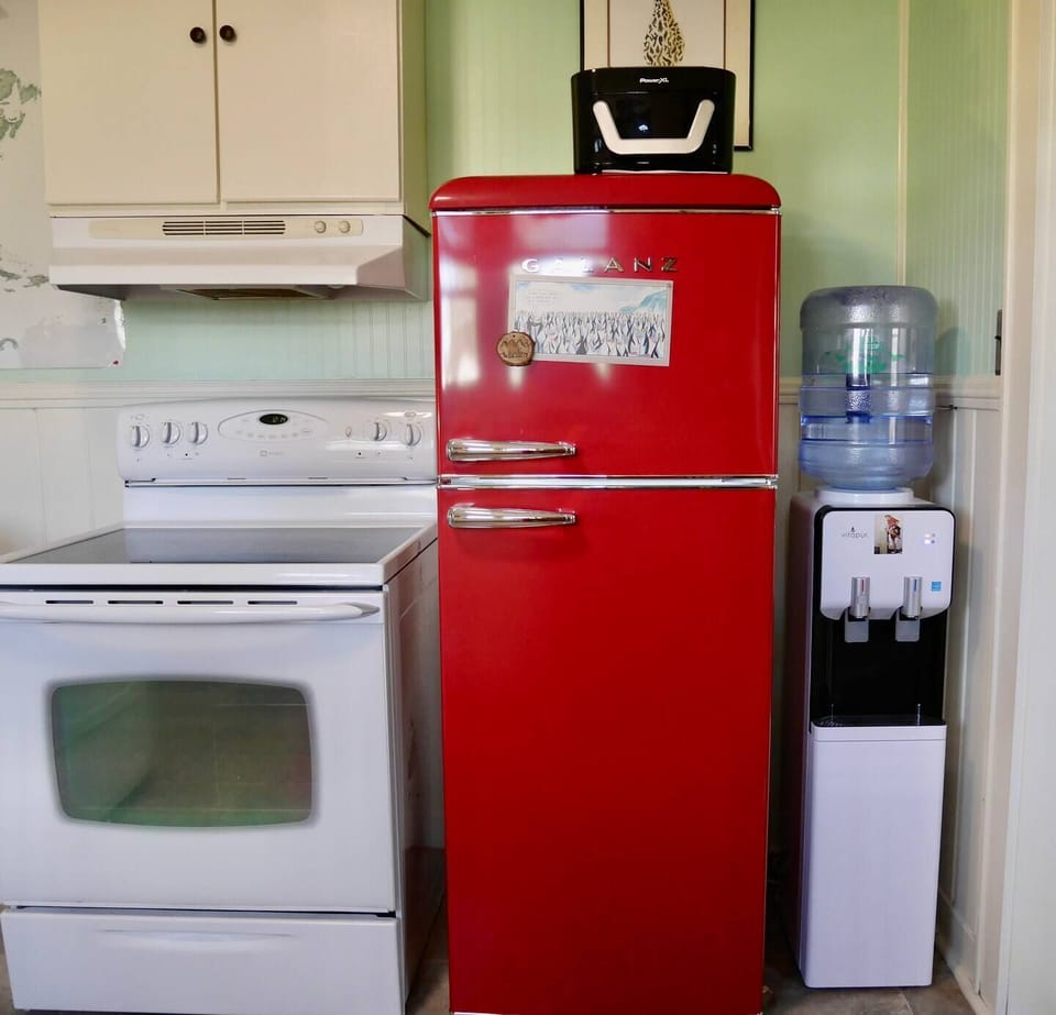 Kitchen includes stove, fridge, washer/dryer and dishwasher.