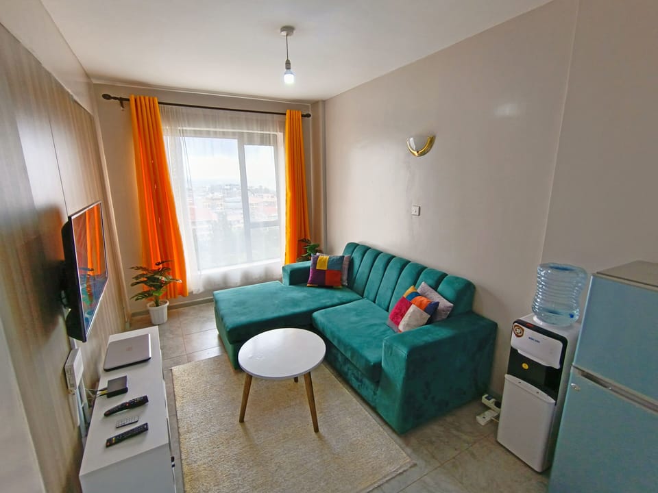Modern 1BR apartment🌇with a panoramic city view in Nairobi.