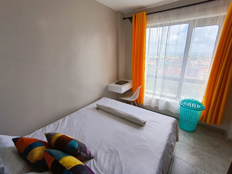 Modern 1BR apartment🌇with a panoramic city view in Nairobi.
