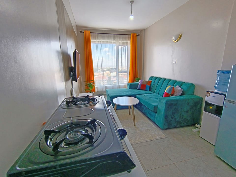 Modern 1BR apartment🌇with a panoramic city view in Nairobi.