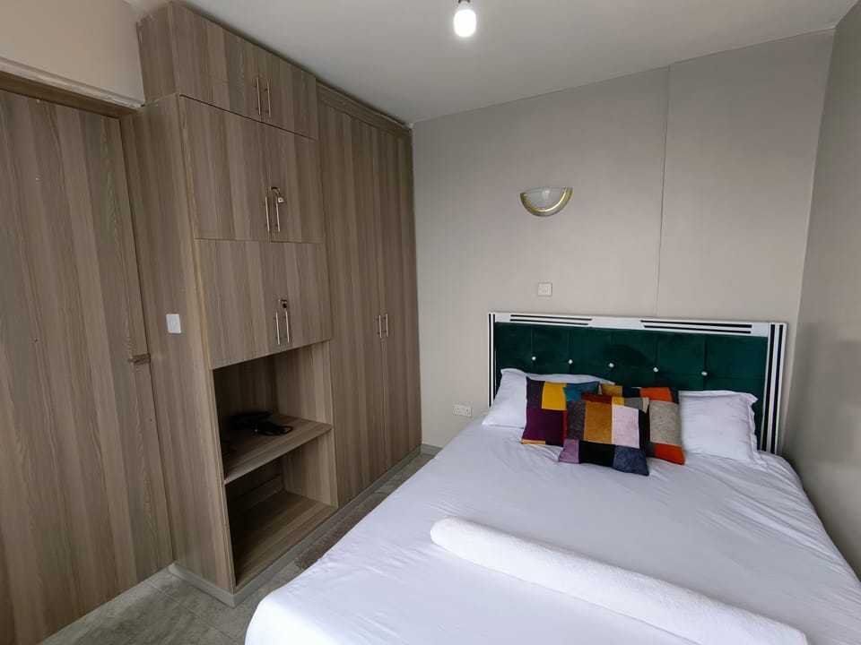 Modern 1BR apartment🌇with a panoramic city view in Nairobi.