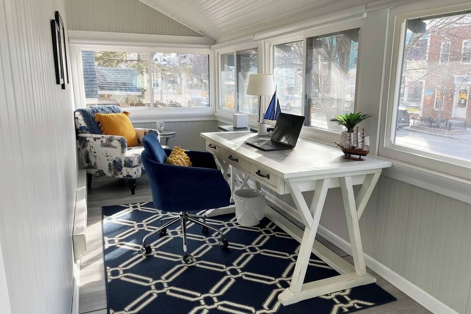 Calm work station with views of charming downtown Delafield. Or just relaxing with a cup of tea or coffee and watching the sunrise and sunsets. 