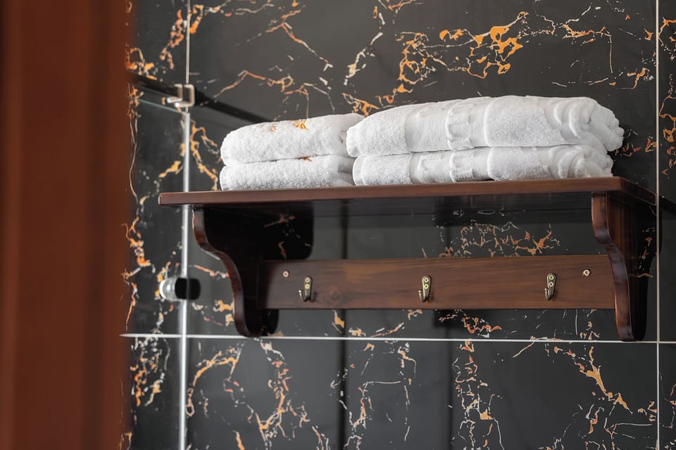 Shower, hydromassage showerhead, designer toiletries, hair dryer
