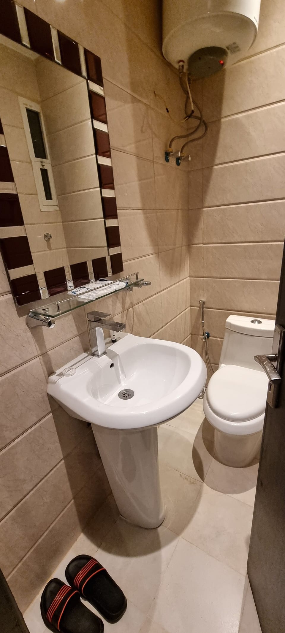 Shower, rainfall showerhead, bidet, towels