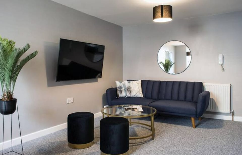 Comfort Apartment | Living area | 32-inch TV with cable channels