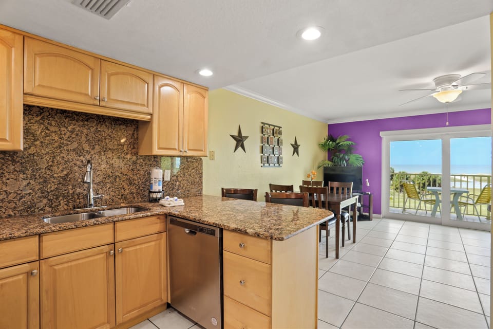 Full Kitchen with Stainless Steel Appliances.