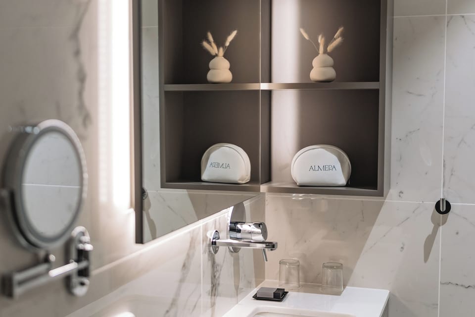 Comfort King Room | Bathroom | Shower, rainfall showerhead, hair dryer, bathrobes