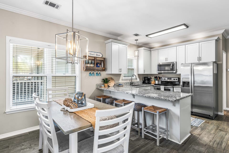 Cook gourmet meals in the kitchen while your guests sit at the bar and watch