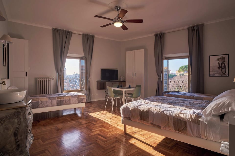 Comfort Quadruple Room | In-room safe, blackout drapes, iron/ironing board, free WiFi