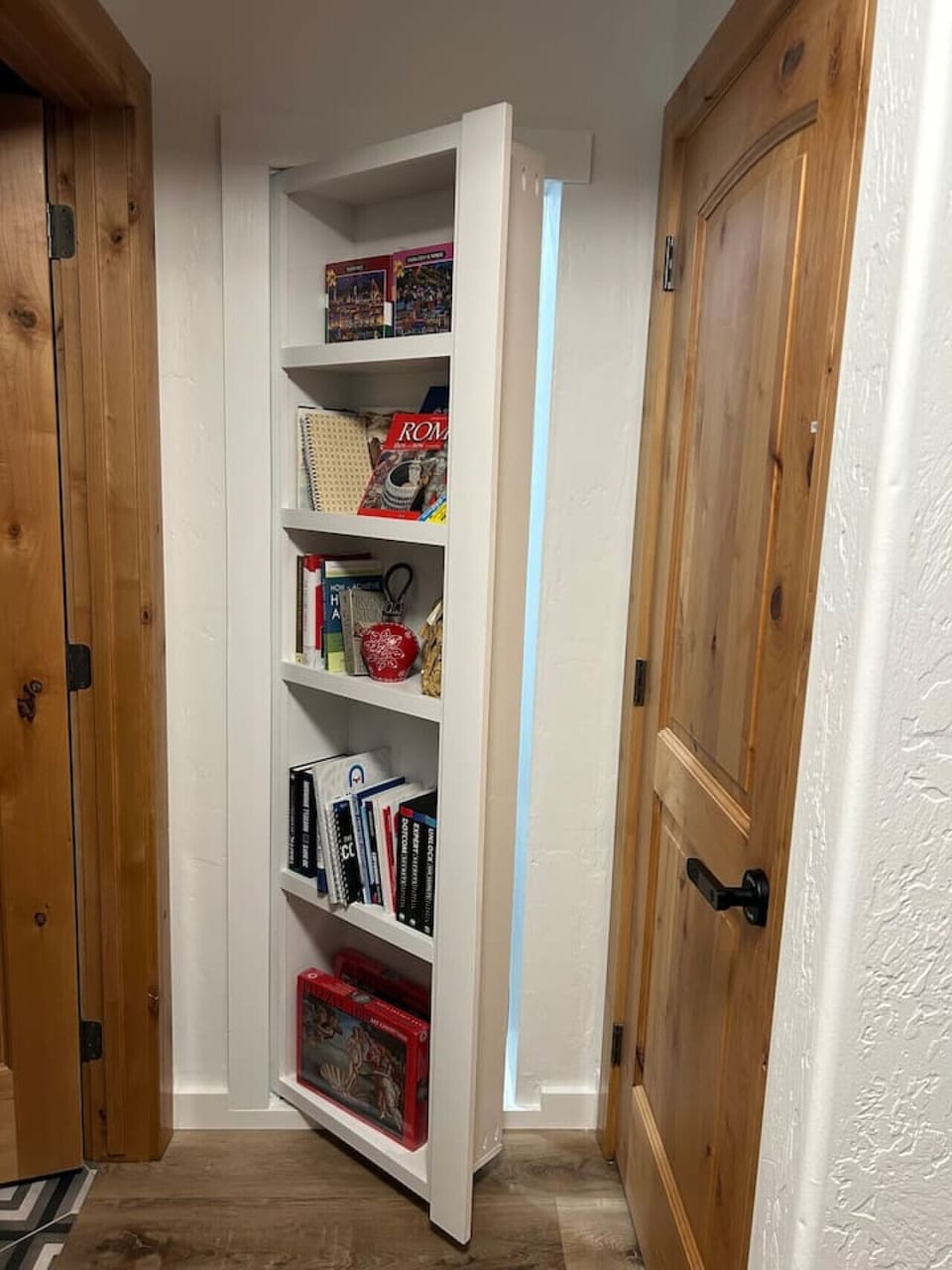 Secret Harry Potter bookshelf door to shower and closet.  Downstairs next to the powder room.