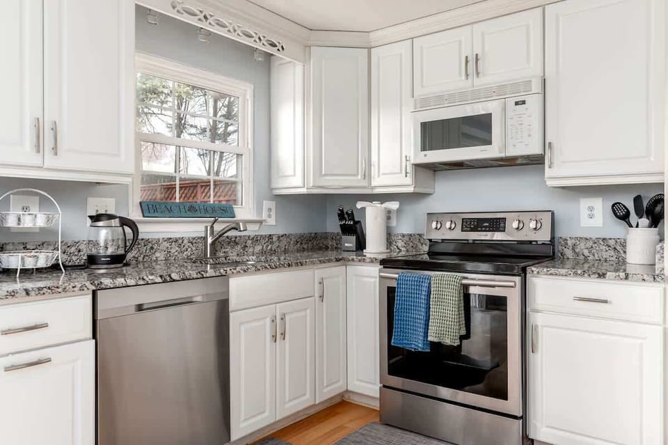 Bright modern kitchen fully stocked for home-cooked meals and gatherings