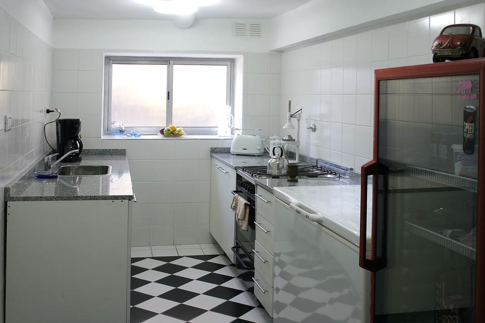 Full-size fridge, microwave, cookware/dishes/utensils