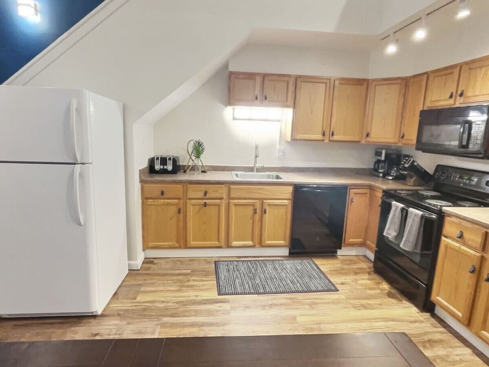Cozy yet spacious kitchen for delightful cooking experiences.