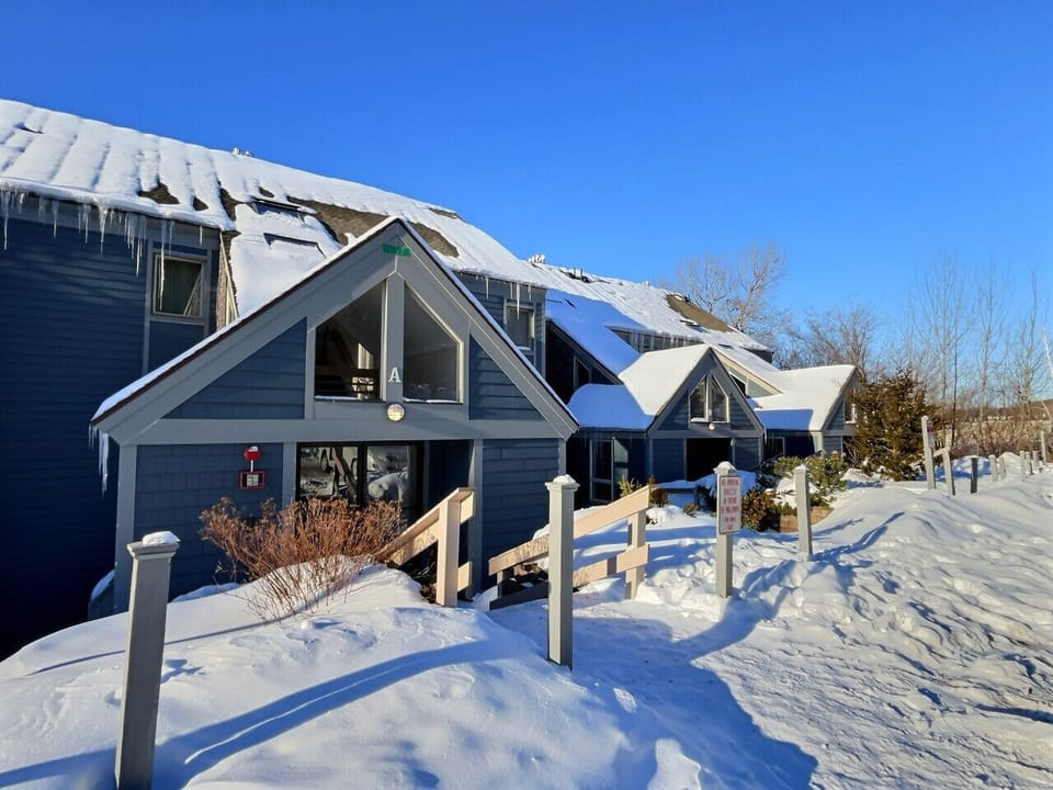 A peaceful apartment stay surrounded by a winter wonderland.