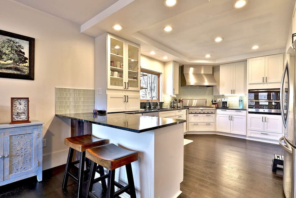 Step into modern culinary comfort in our cozy, updated kitchen. From sleek appliances to stylish finishes, every detail is designed to inspire your inner chef and create unforgettable moments around the table.