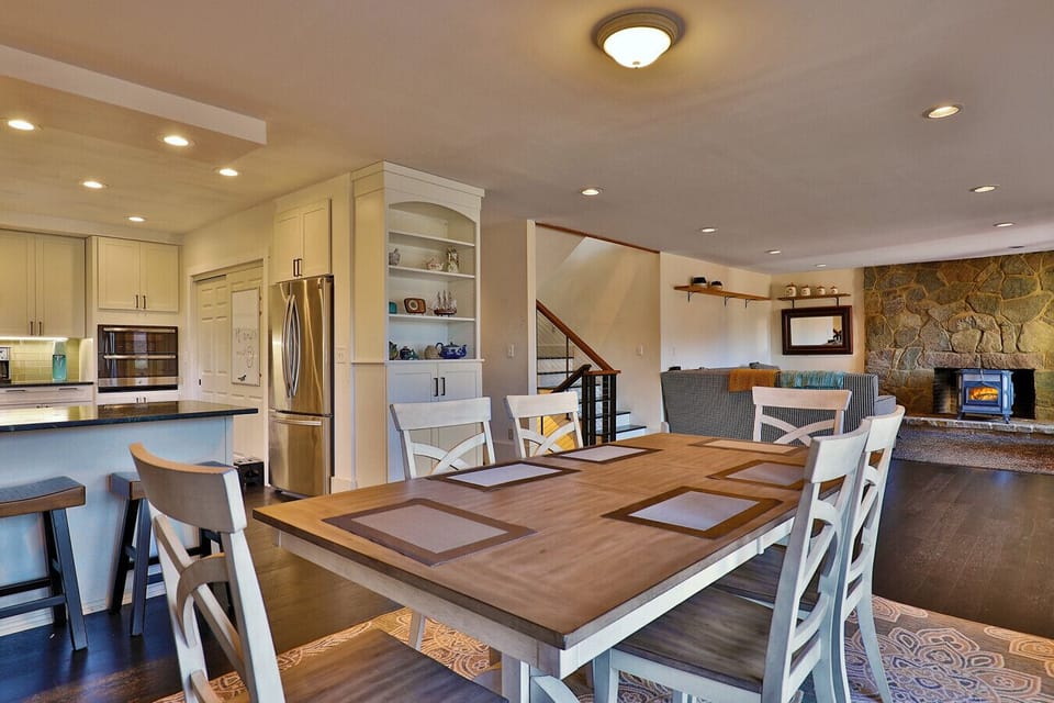 Dining area conveniently located between kitchen and living room.