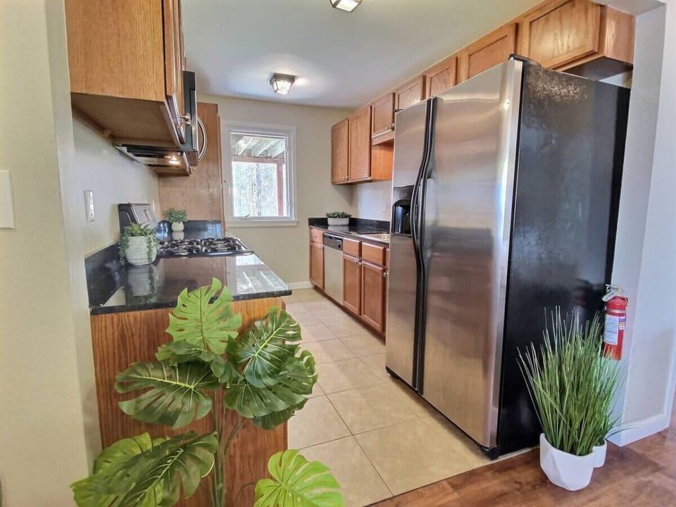 Step into our cozy rustic kitchen for warmth and functionality.