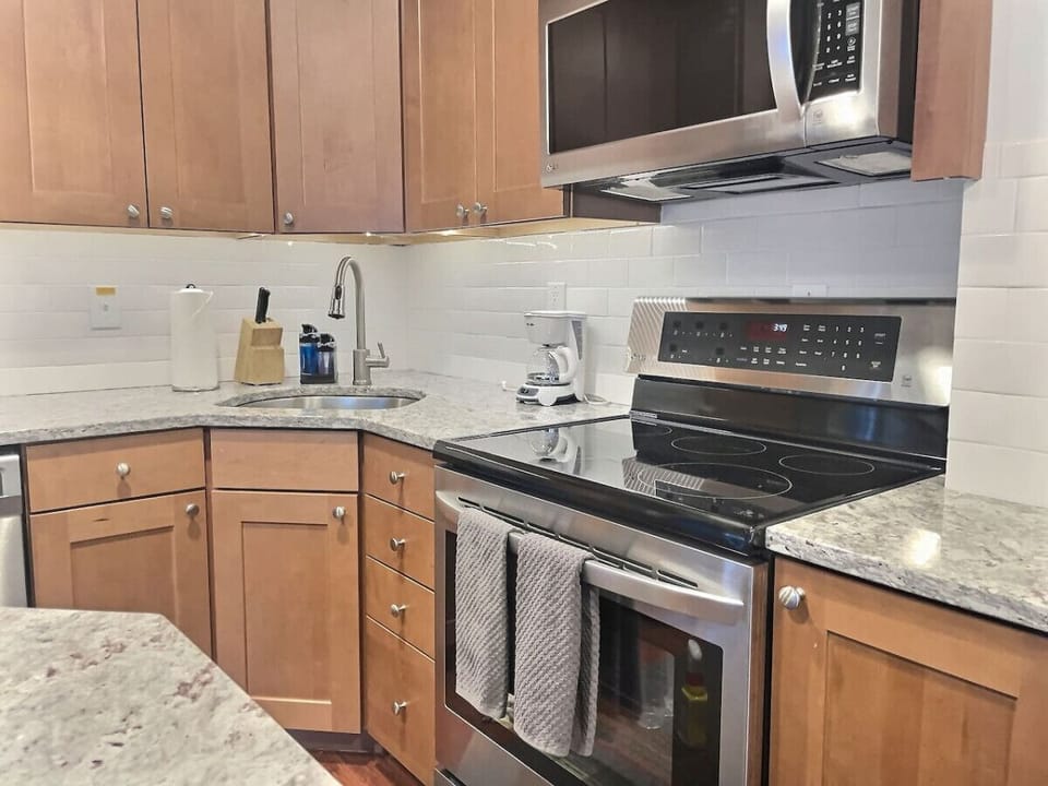 The kitchen is stocked with all the essential tools you may need in order to cook your favorite meals.