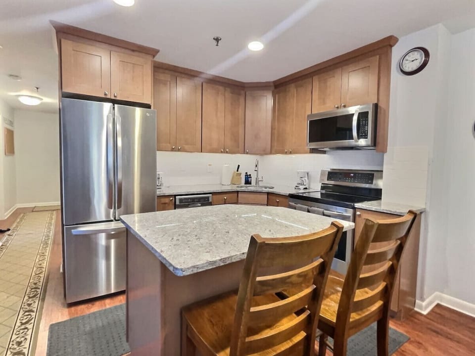 Step into modern culinary comfort in our cozy, updated kitchen. From sleek appliances to stylish finishes, every detail is designed to inspire your inner chef and create unforgettable moments around the table.