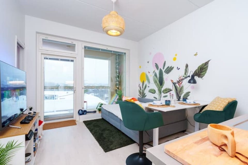 Table can also go low, to be used for dining or as breakfast bar.