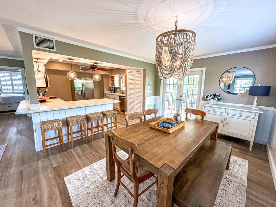 Dine at the spacious dinner table or breakfast bar