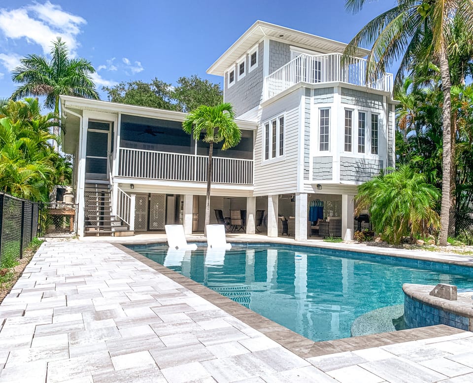 Lounge by the heated pool in comfort and take in the best views of the ocean.