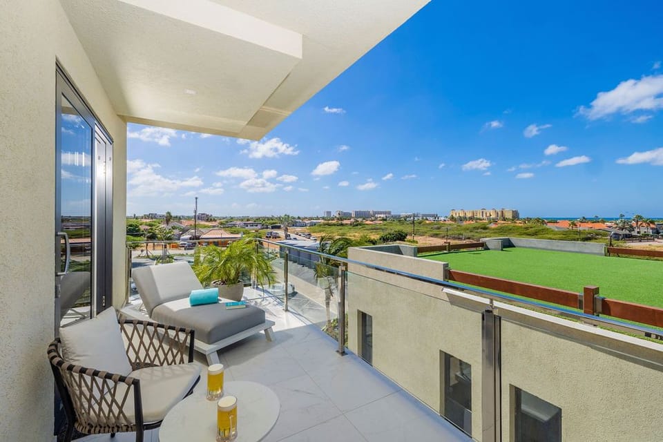 Step into your own personal sanctuary, where the balcony becomes your escape to serenity.