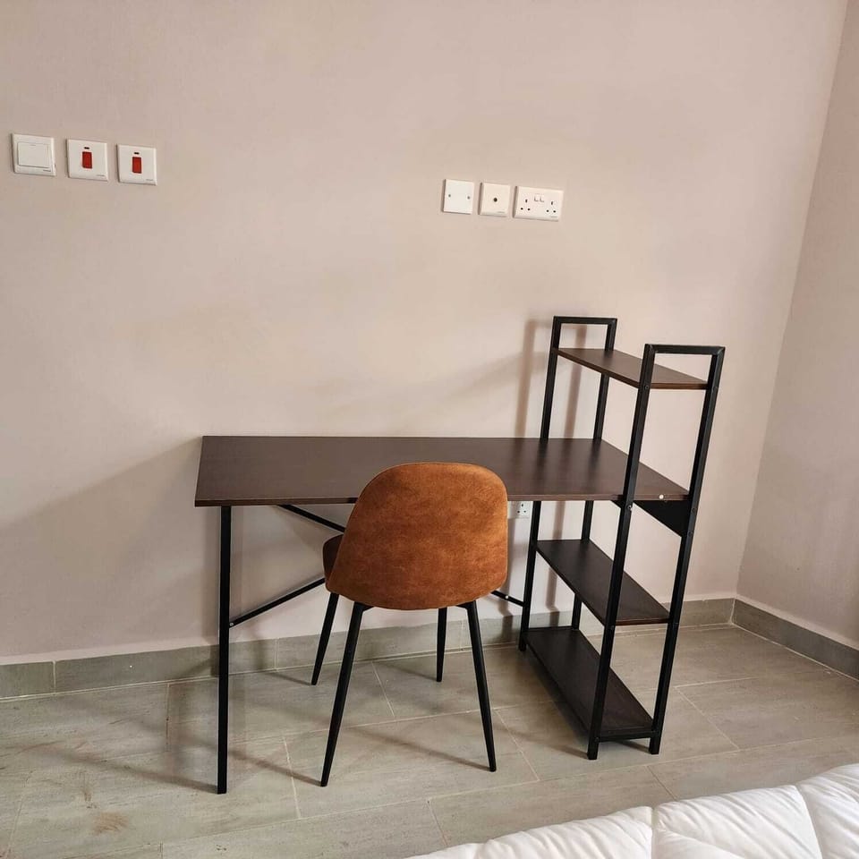 Family Apartment | Living area | 24-inch Smart TV with satellite channels