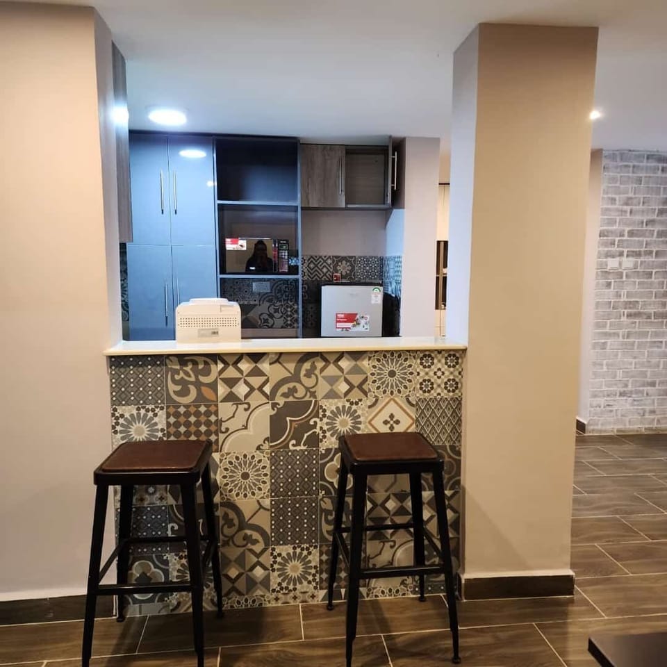 Family Apartment | Private kitchen | Fridge, microwave, cookware/dishes/utensils