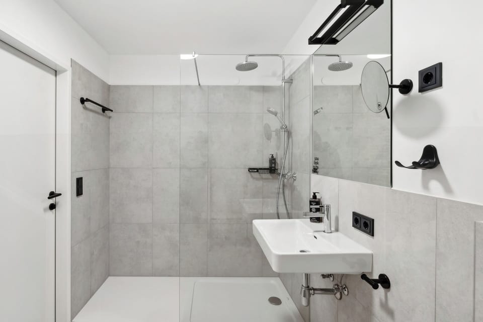Queen Room with sofa bed | Bathroom | Eco-friendly toiletries, hair dryer, towels, soap