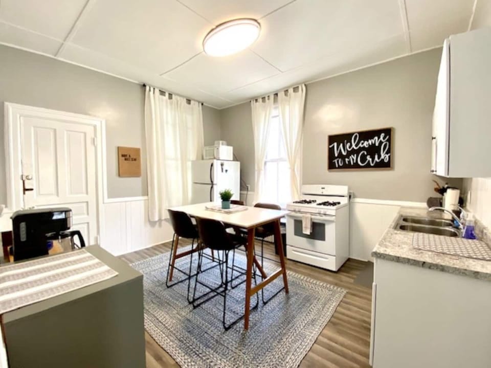 Full kitchen with stove, refrigerator, microwave, dishwasher, and the basics for easy meals during your stay.