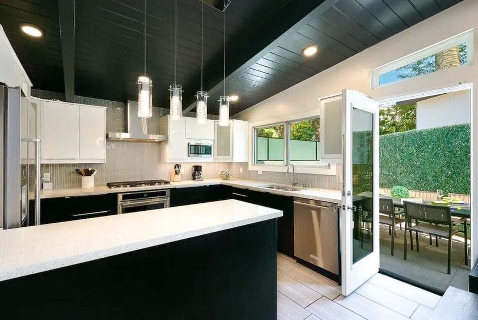 Well equipped kitchen with door to patio.