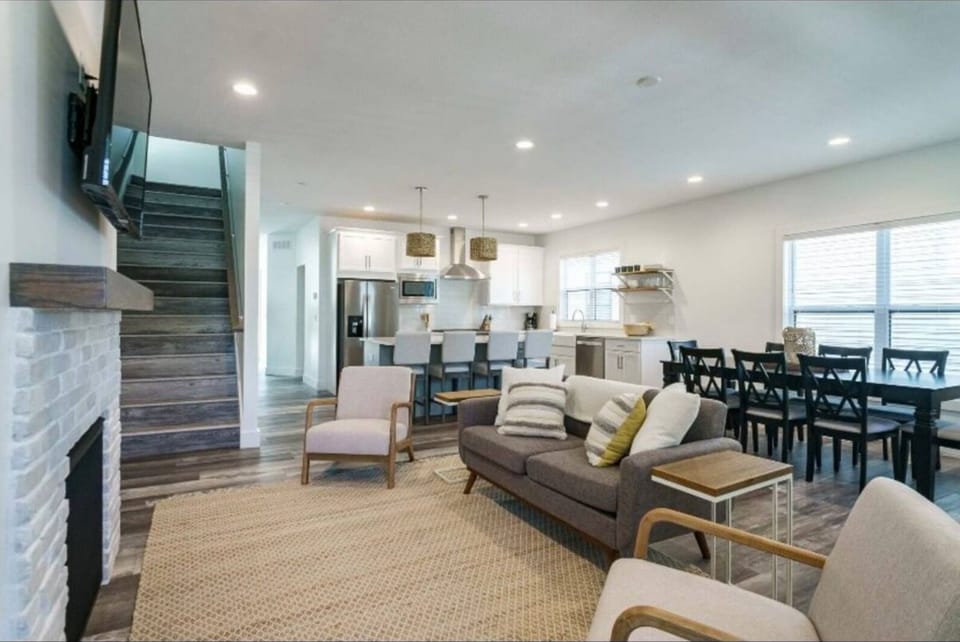 Living room open to kitchen and dining area