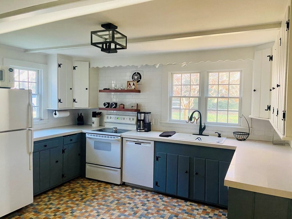 Charm of the original kitchen but upgraded the counters and all new appliances 
