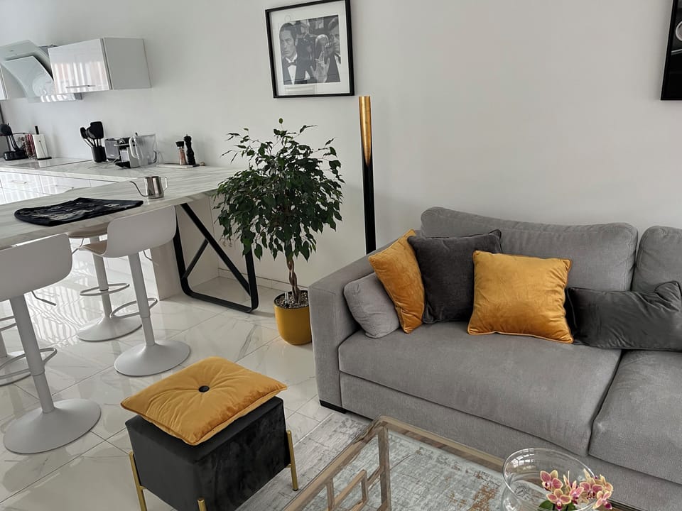 City House | Living area | Flat-screen TV, computer monitors, printers