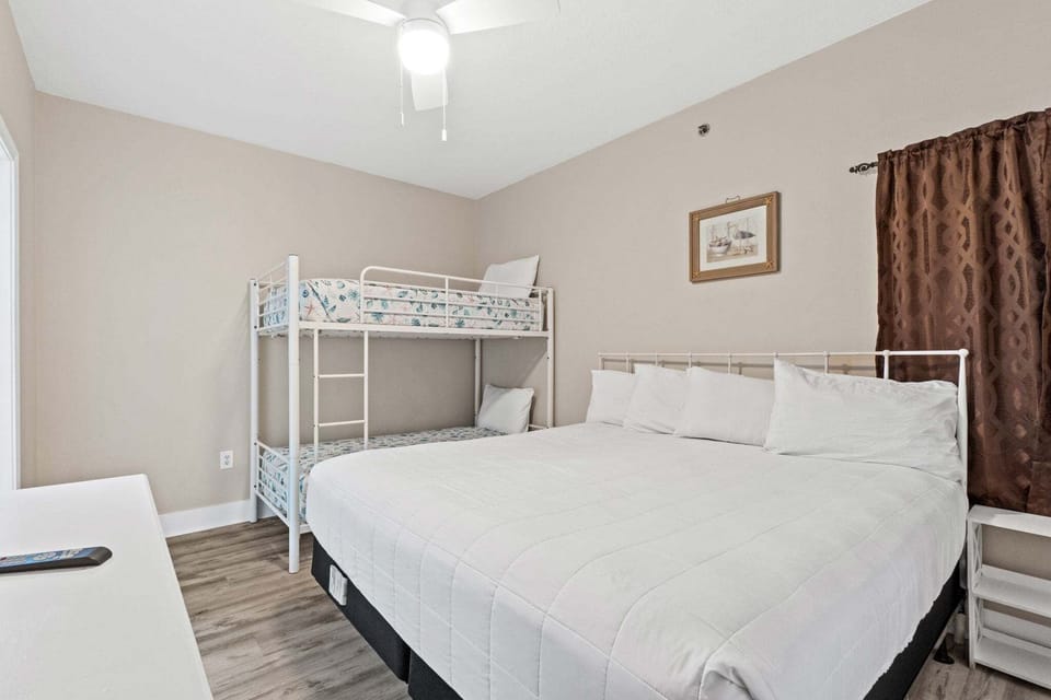With its versatile layout, this bedroom offers both comfort and functionality for guests.