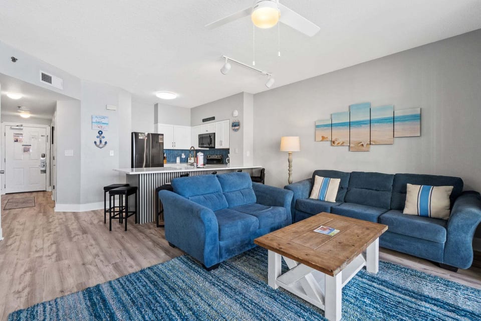 Its open layout flows seamlessly into the kitchen, making it easy to stay connected whether you're cooking, dining, or lounging.