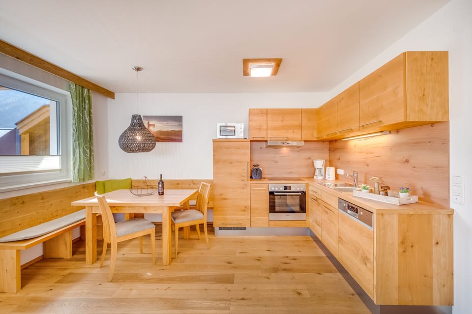 Comfort Apartment, 2 Bedrooms | Private kitchen | Full-size fridge, microwave, stovetop, dishwasher