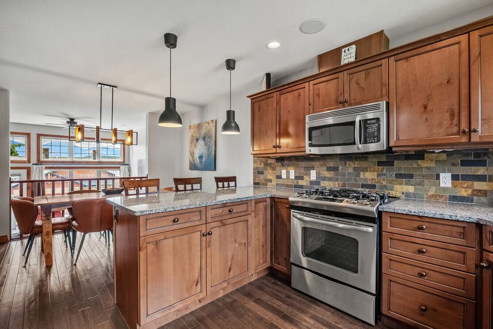Full kitchen with access to the second balcony with a BBQ.