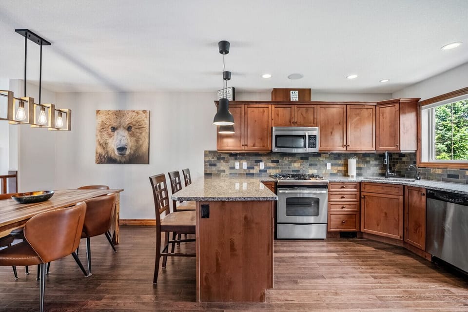 Full kitchen with access to the second balcony with a BBQ.