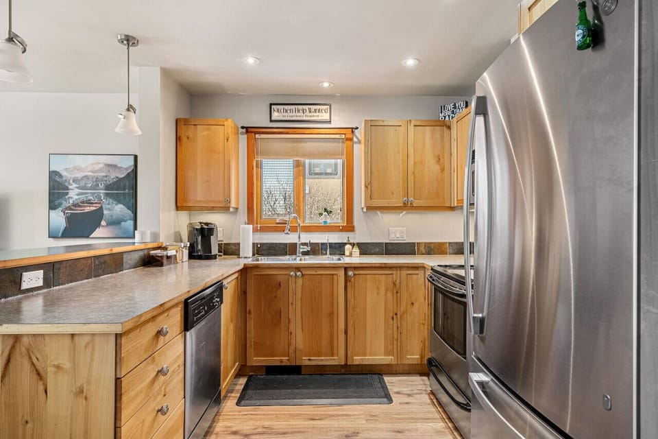 Full kitchen with a blender, drip & Keurig coffee maker, ground coffee, tea, sugar, and basic condiments (ketchup, mustard & relish.)
