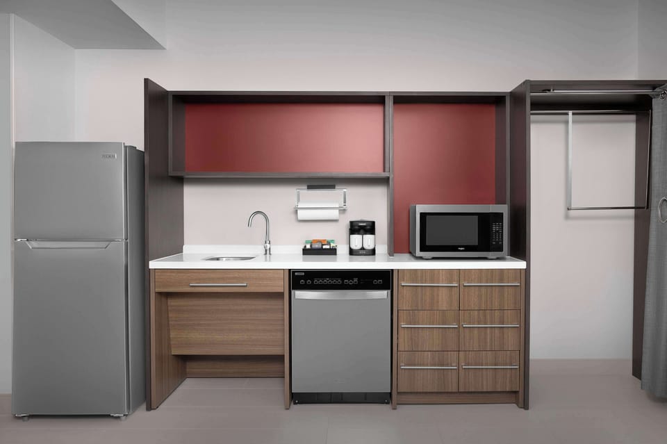 Suite, 1 King Bed, Accessible (Roll-In Shower) | Private kitchen | Coffee/tea maker