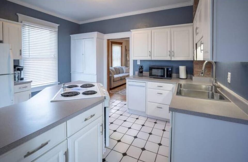 View to living room area. Fully appointed kitchen for your cooking needs.