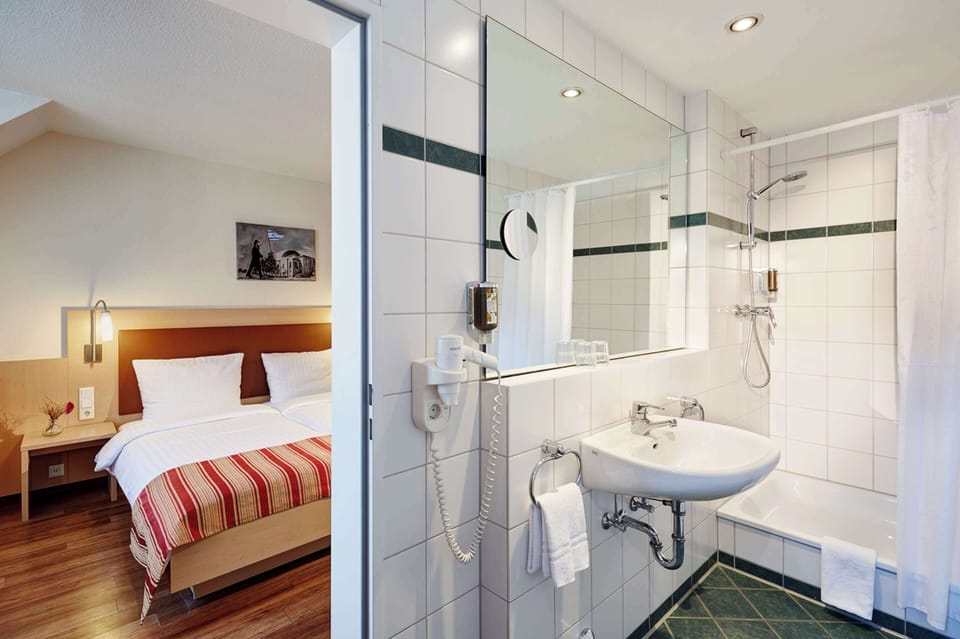 Hair dryer, towels, shampoo, toilet paper