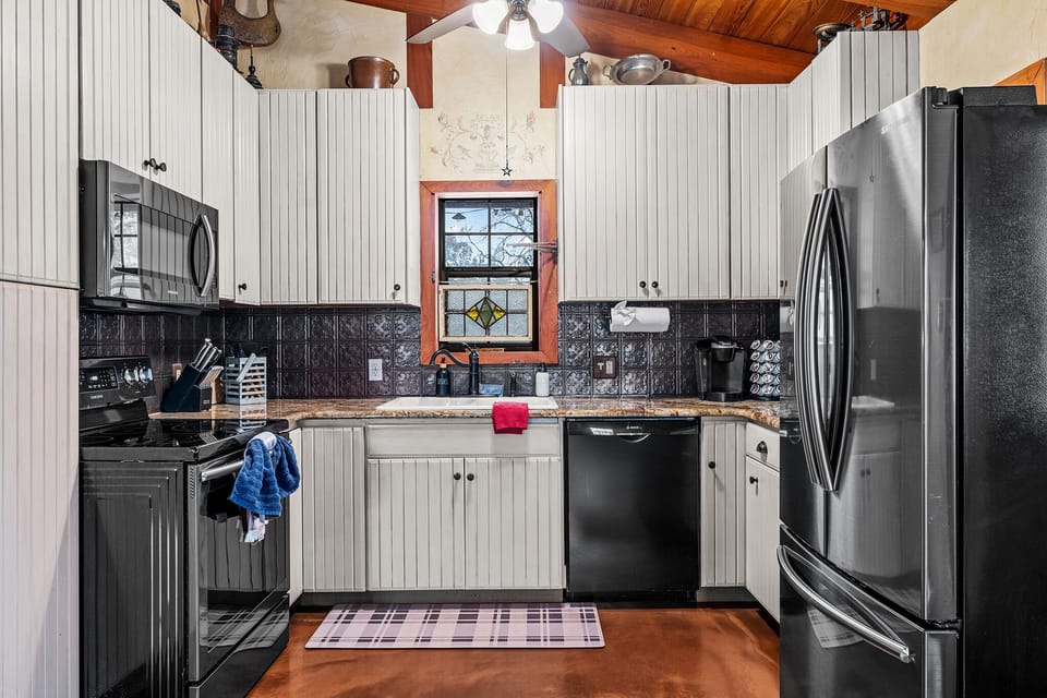 The countertops, adorned with sleek finishes and minimalist decor.