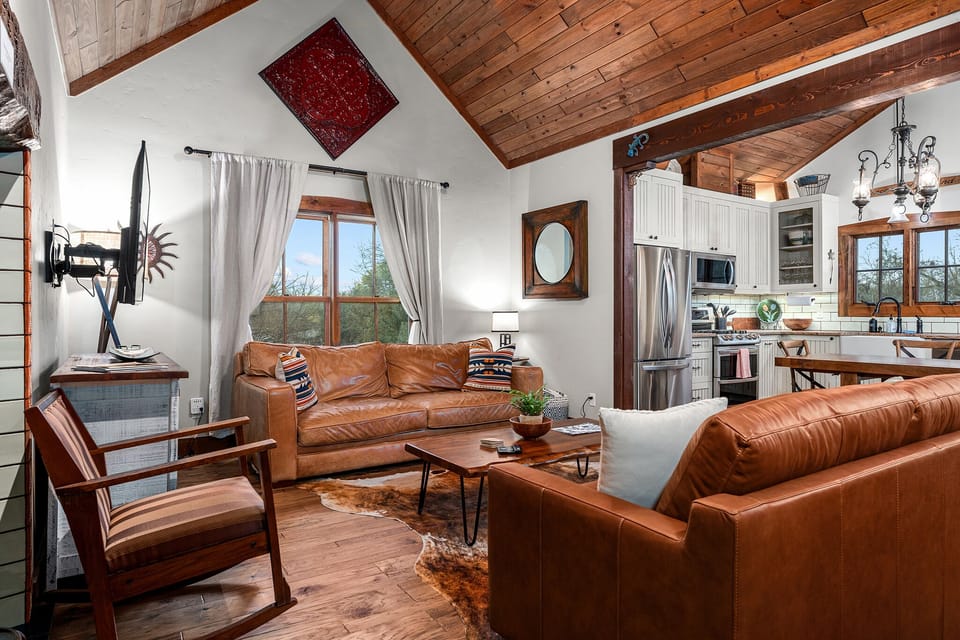 Two lush, comfortable living rooms between two houses on the estate